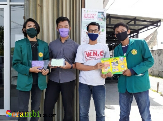 Kolaborasi Hima Manajemen dan Kelompok OKP serta Mahasiswa Se-Riau Bagikan 1000 Masker