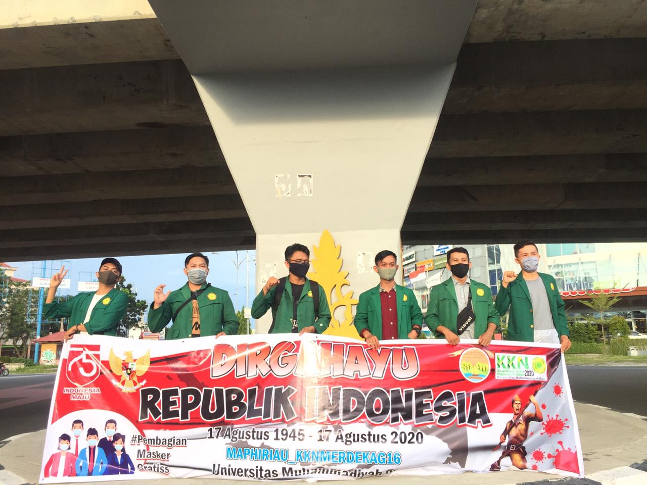 KKN Merdeka MAPHI Riau G16 Bagi Masker Peduli Karthula dan Putus Penyebaran COVID - 19